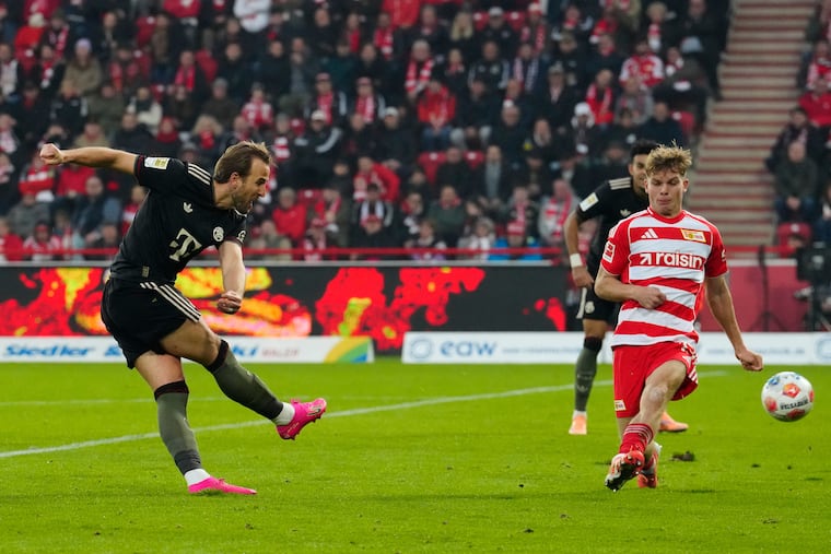 Bayern Munich's English striker Harry Kane (left) is one of the best-known stars in the Bundesliga.