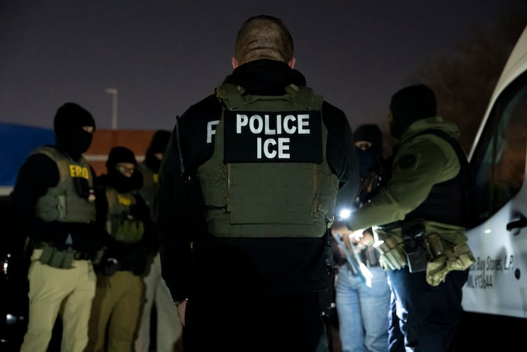 U.S. Immigration and Customs Enforcement officers gather for a briefing before an enforcement operation on Monday in Silver Spring, Md.