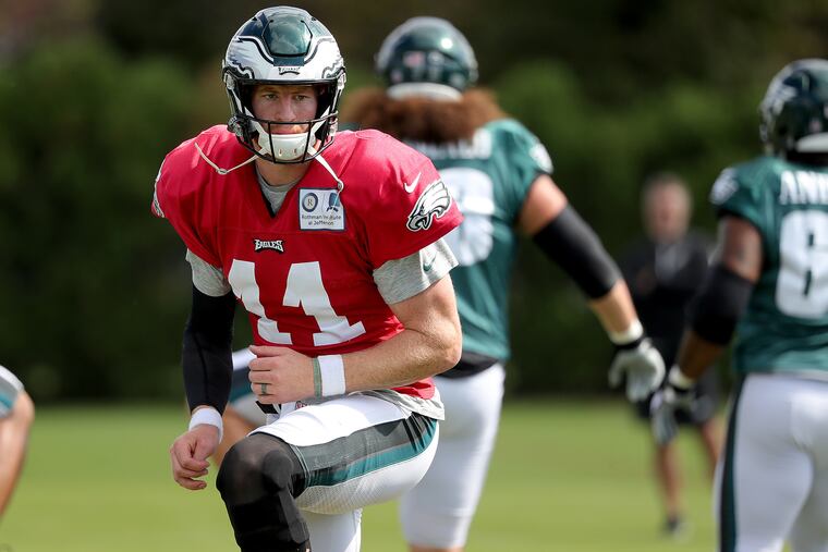 Eagles Carson Wentz warms up during Eagles practice at the NovaCare Complex in Philadelphia, PA on October 3, 2018. DAVID MAIALETTI / Staff Photographer