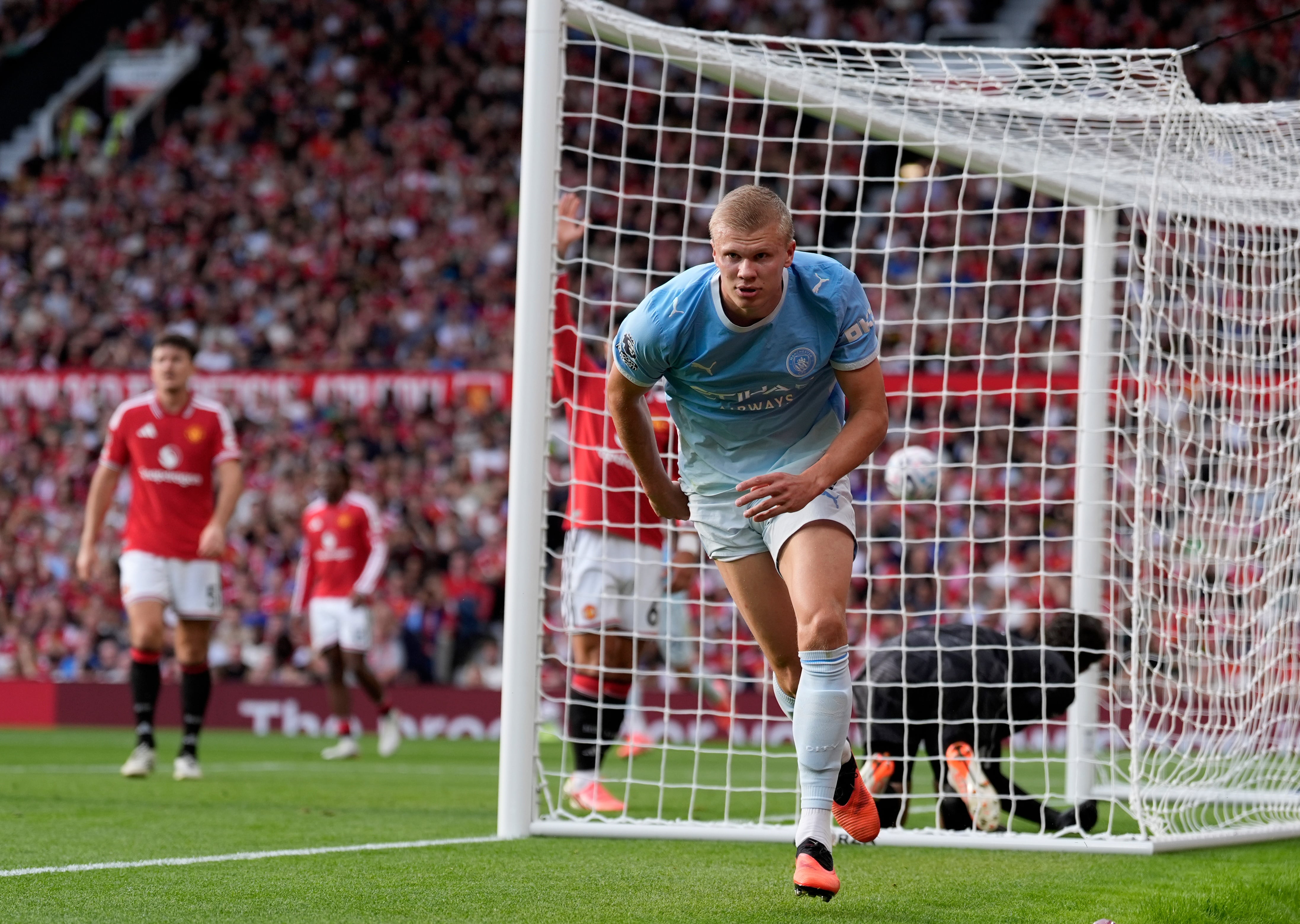 Haaland's disputed goal wins Manchester derby for 10-man City against United
