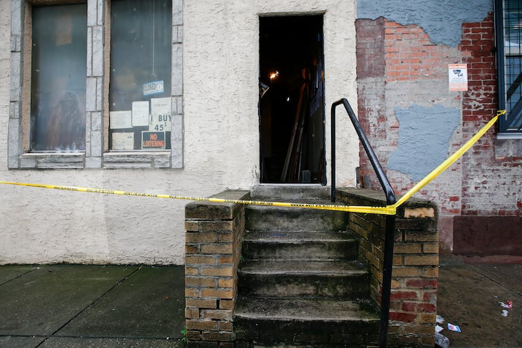 Police crime-scene tape closes off a property on the 3600 block of Kensington Avenue in the Harrowgate section of Kensington after a triple shooting inside on Monday, April 13, 2020.