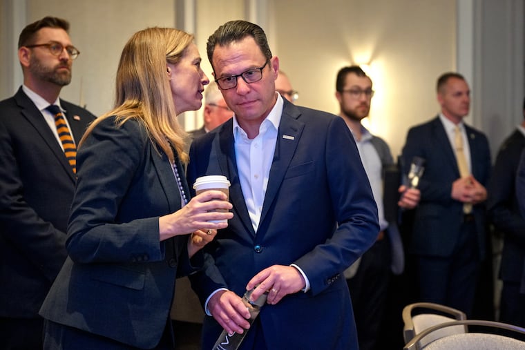 Democratic Govs. Mikie Sherrill and Josh Shapiro talk before they’re introduced to speak on a panel with two Republican governors at a National Governors Association event in Philadelphia.