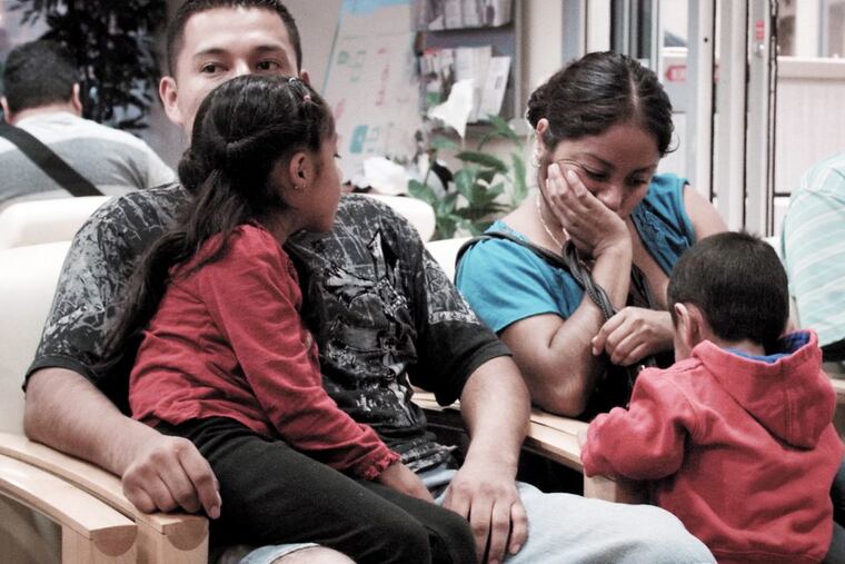 At Puentes de Salud health clinic in South Philadelphia, volunteers serve uninsured Latino immigrants.