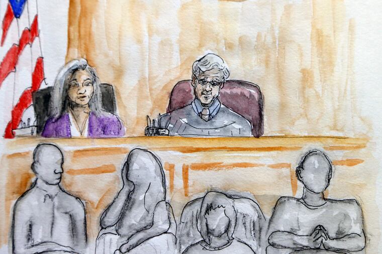 In this courtroom sketch Judge Richard Moore, top right, presides over the trial of James Alex Fields Jr. during the second day of jury selection in Charlottesville General District Court in Charlottesville, Va., Tuesday, Nov. 27, 2018. Fields is accused of killing a woman during a white nationalist rally in Virginia last year. (Izabel Zermani via AP)