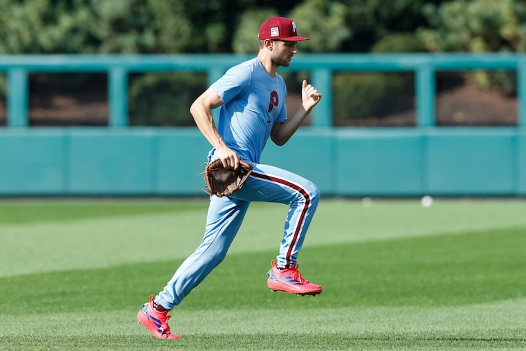 Phillies shortstop Trea Turner tests his strained right hamstring with agility drills Thursday at Citizens Bank Park.