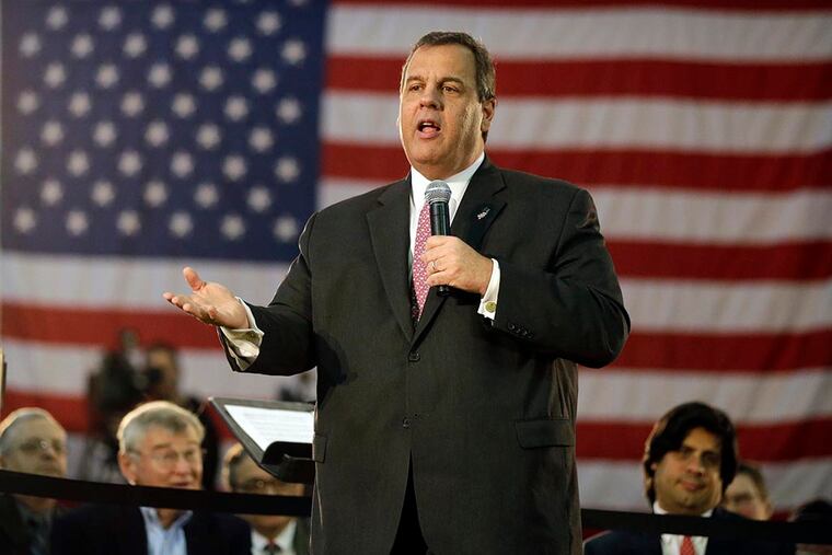 Gov. Christie defended settlement of a lawsuit with ExxonMobil and highlighted his decision to expand Medicaid. ( Mel Evans / AP Photo )