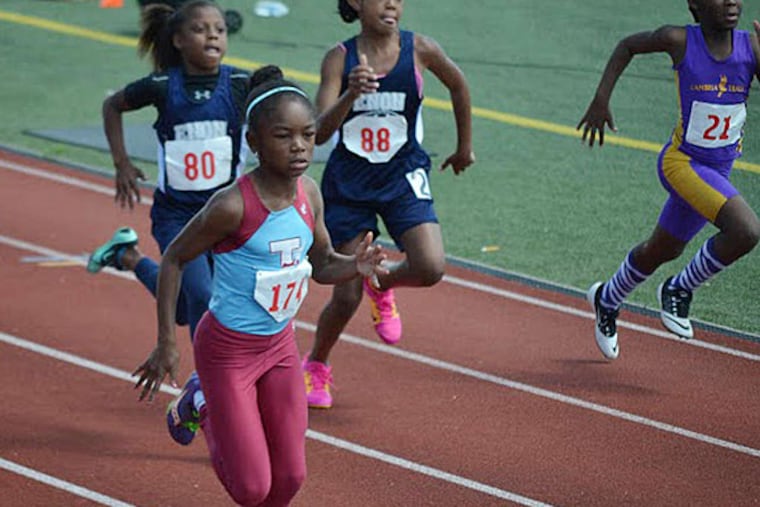 Avery Lewis at the United Age Group Track Coaches Association Youth Invitational in Chester in 2014. Last July, she won the 100- and 200-meter races and the long jump at the Amateur Athletic Union (AAU) Junior Olympics, breaking the AAU long-jump record for her age.