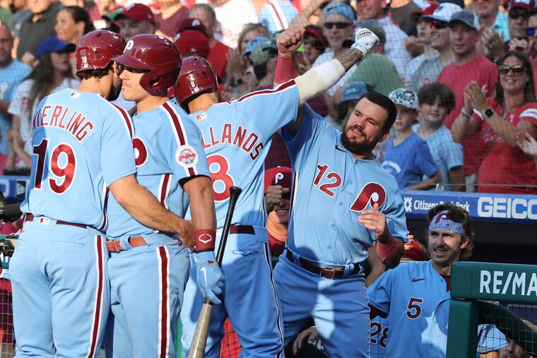 Kyle Schwarber (right) congratulates Nick Castellanos after a home run.