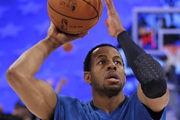 Andre Iguodala scored 12 points in 14 minutes in his first All-Star Game. (Chris O'Meara/AP)