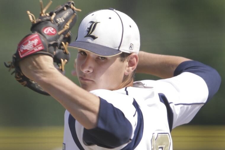 La Salle's pitcher Dominic Cuoci throws against SJ Prep during the first inning of the teams' Catholic League playoff game.