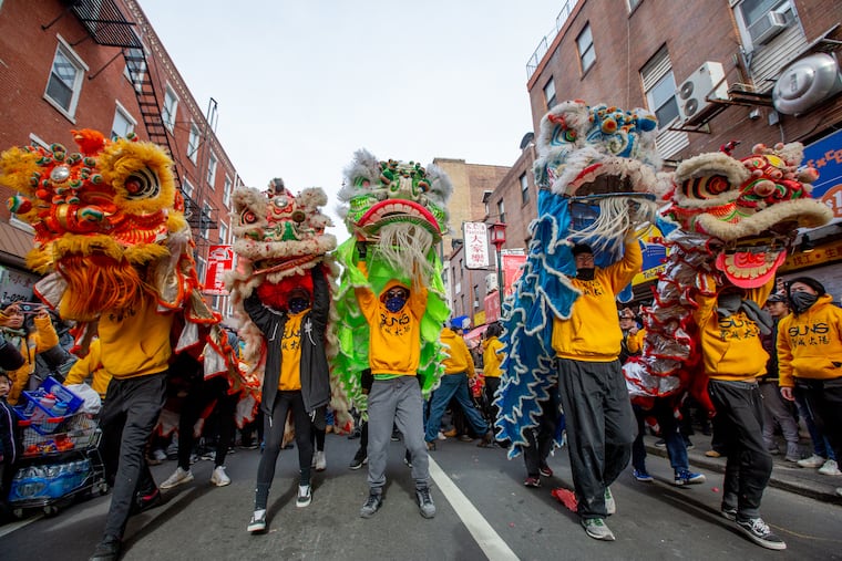 Members of the Philadelphia Suns walk with Lion heads in the Chinese Lunar New Year parade Sunday, February 10, 2019. Philadelphia will welcome the year of the horse with a parade in Chinatown Monday night.