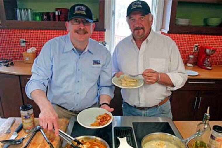 Michael Dernoga (left) and Ridgely B. Francisco named their Lizbeth Lane Gourmet Cuisine line of "simmer sauces" for their street. They – and food-industry experts – say the sauces could fill needs in the market for all-natural and gluten-free products.