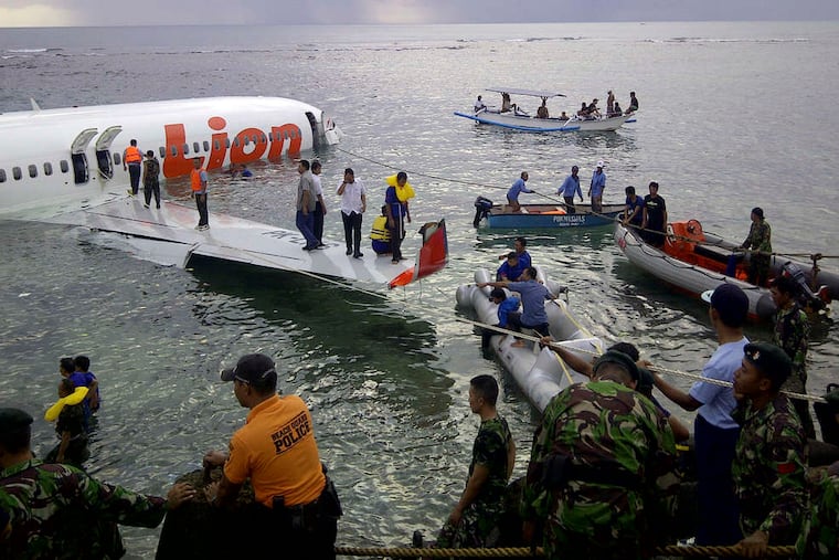 Indonesian police and rescuers used rubber boats to evacuate the 101 passengers and seven crew from the Boeing 737.