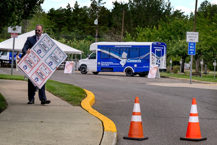 Paul Rosenberg, operations manager at the South Jersey Transportation Authority (SJTA ) leaves with visuals aids following the event to launch SJ Connects Monday, June 1, 2026 at the Frank A. Farley Service Area on the Atlantic City Expressway.