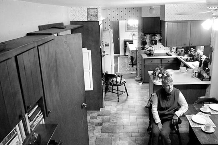 June Paterson, 76, wants to sell her Concord Township house, but the downturn has left her in limbo for more than a year, unable to raise the cash to move to a retirement community and tired of living in a house dressed to sell.