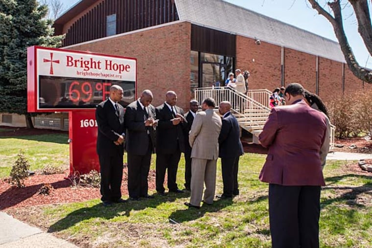 A group of deacons gathers for conversation outside after Sunday's worship service at Bright Hope Baptist Church. Some members of the congregation want Senior Pastor Kevin R. Johnson removed. Sunday, April 6, 2014, Philadelphia, Pennsylvania. ( Matthew Hall / Staff Photographer )