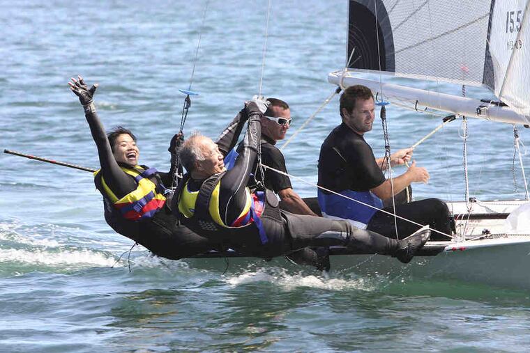Father-daughter team Ron and Christina must sail a skiff and retrieve a clue from a buoy.