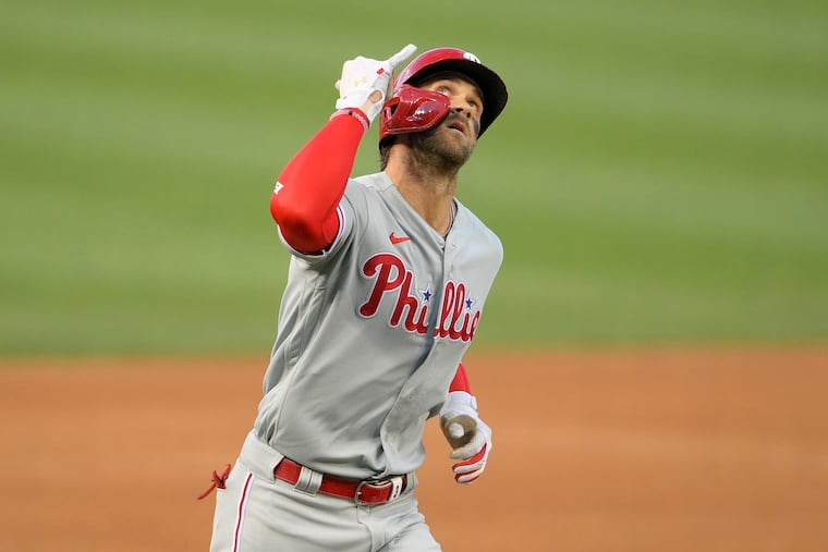 The Phillies' Bryce Harper celebrates after his two-run home run during the first inning against the Nationals.