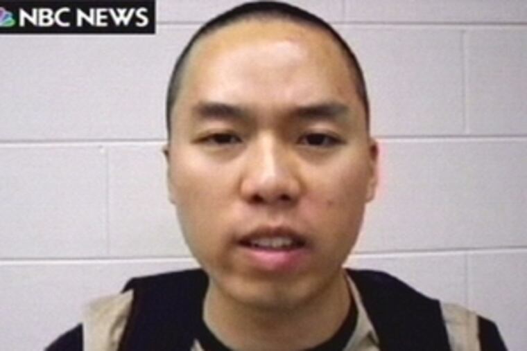 An image from a video of Cho Seung-Hui is shown by NBC News yesterday.
