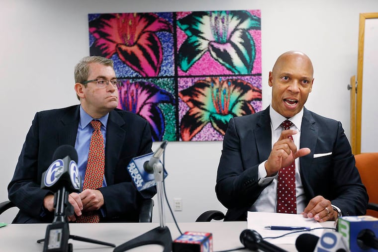 Chairman Bill Green (left) and Supperintendent William R. Hite speak to the media after the School Reform Commission voted to cancel the contract with the Philadelphia Federation of Teachers. October 6, 2014. ( MICHAEL S. WIRTZ / Staff Photographer )