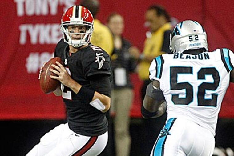Matt Ryan and the Falcons beat the Panthers Sunday. (John Bazemore/AP)
