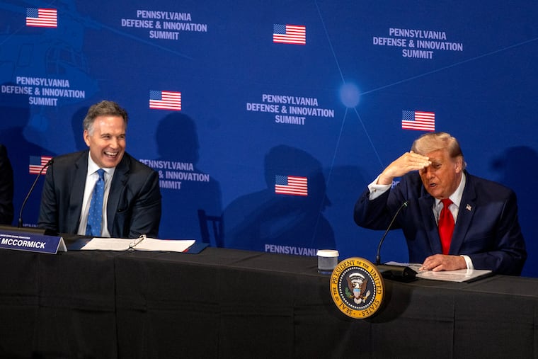 President Donald Trump looks into the audience as he appears at a Defense and Innovation Summit hosted by U.S. Sen. Dave McCormick (left) at the US Army War College in Carlisle Wednesday, July 15, 2026.