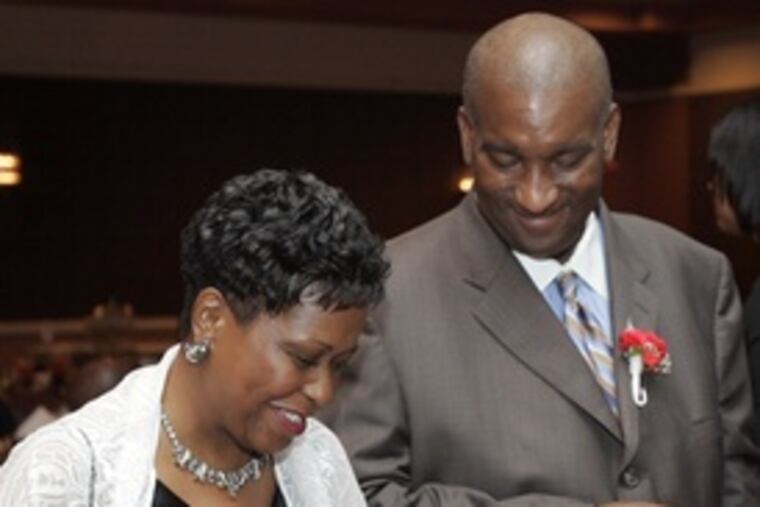 Inquirer deputy managing editor Sandra Long and Bryan Monroe, president of the National Association of Black Journalists. Long received a Trailblazer Award.
