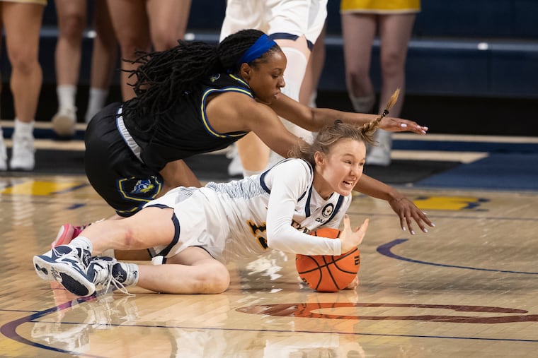 Grace O'Neill (right), pictured in a game against Delaware earlier this month, had 19 points on Friday.