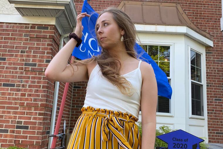 Hofstra graduate Katie Schaeffer in front of her home
