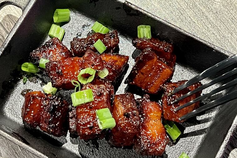 Bacon burnt ends tossed in bacon-infused barbecue sauce at Bake'n Bacon, 1148 S. 11th St.