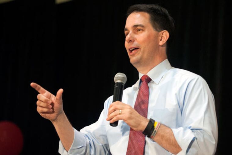Wisconsin Gov. Scott Walker speaks to a full ballroom during the Northeast Republican Leadership Conference in Philadelphia on Saturday, June 20, 2015. (MICHAEL PRONZATO/Staff Photographer)