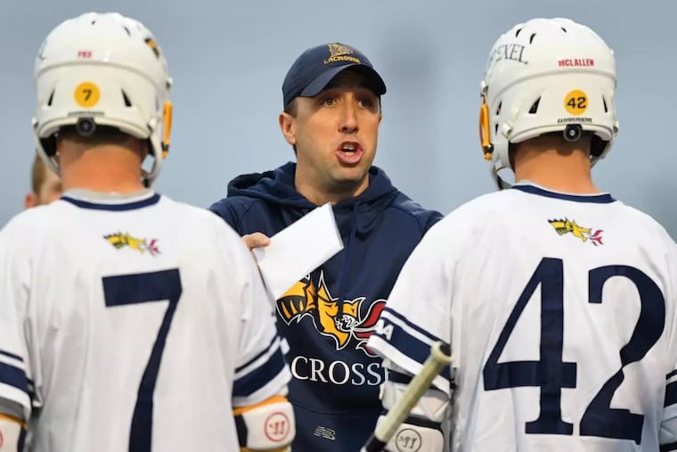 Steve Boyle (center) is the new men's lacrosse coach at Drexel after spending 10 seasons as an assistant.