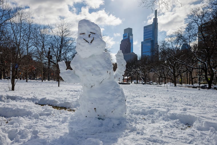 At least someone is happy about the snow. This character is having his day on the Benjamin Franklin Parkway.