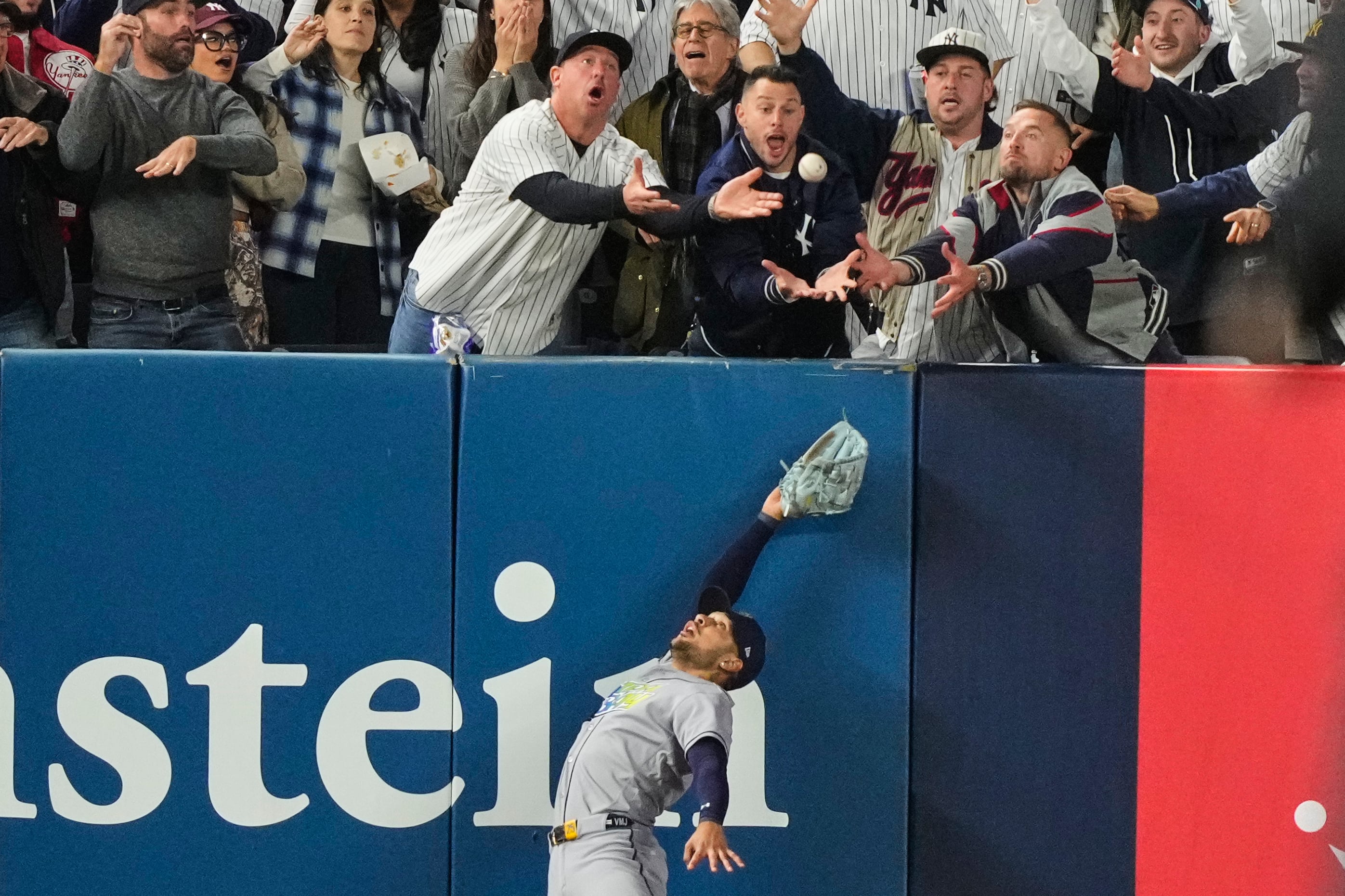 Fan interference denies Anthony Volpe a tying homer as Yankees get swept by Rays in ALDS