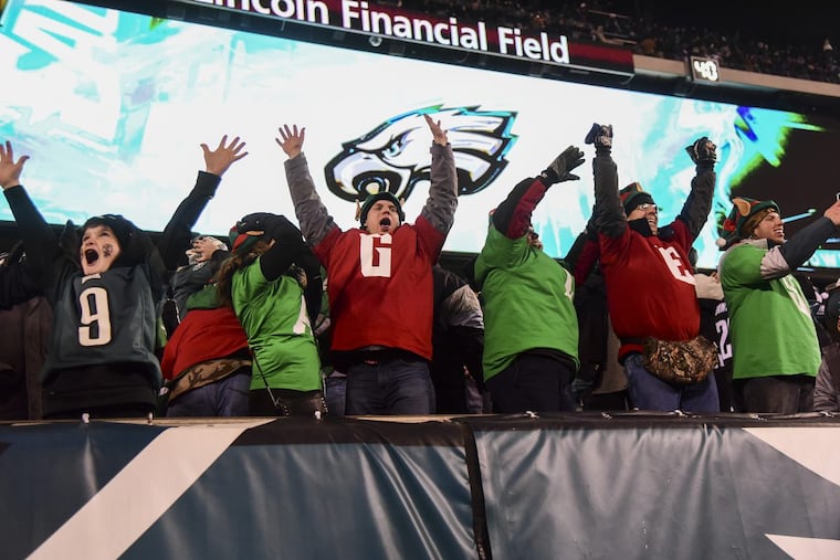 Eagles fans celebrate a touchdown against the Oakland Raiders at Lincoln Financial Field this past season. SeatGeek’s partnership with the NFL will allow Eagles fans to transfer tickets more easily this coming season.