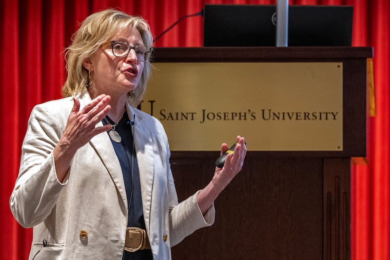 Kate Shaw, executive director of the Pennsylvania State Board of Higher Education, speaks at a public hearing on the strategic plan for higher education held at St. Joseph's University in April.
