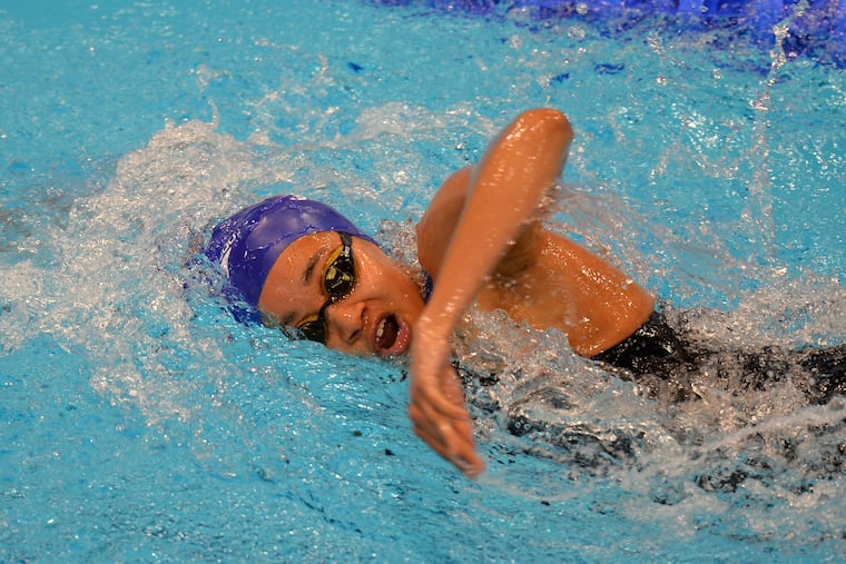 The International Swim Federation made a controversial decision, rooted in systemic racism, when it ruled that swim caps made for Black hair can't be worn at the Olympics. (Press Association via AP Images)