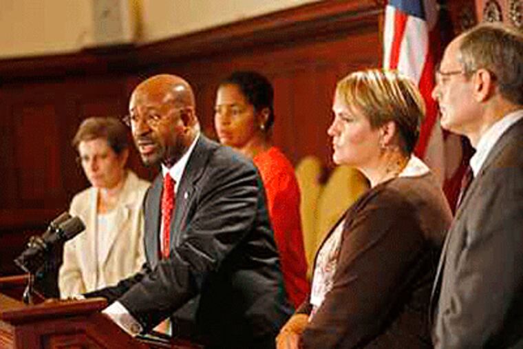 Mayor Michael A. Nutter (at podium) talks to the media about the grand jury report. He's flanked by from left, Joan Markman, chief integrity officer, Shelley Smith, city solicitor, Anne Marie Ambrose, DHS commisioner, and Donald Schwarz, health commisioner. (Michael S. Wirtz / Inquirer).