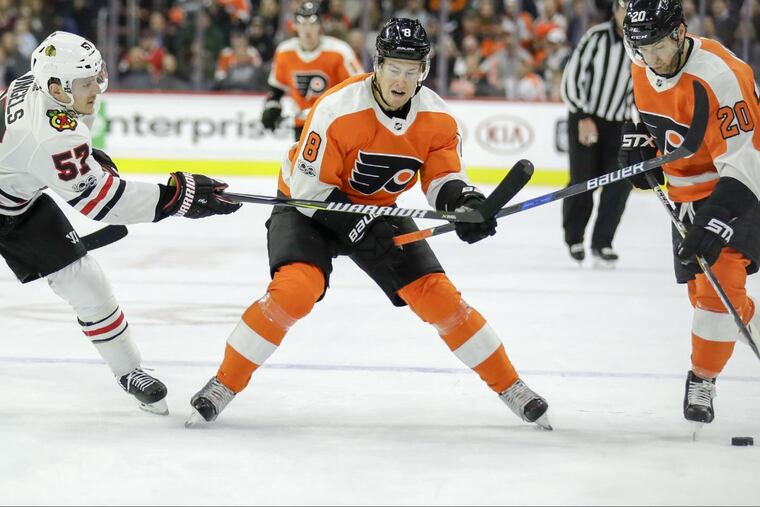 Robert Hagg (center) had five hits and helped shut down Chicago’s top line in the Flyers’ 3-1 win Thursday.