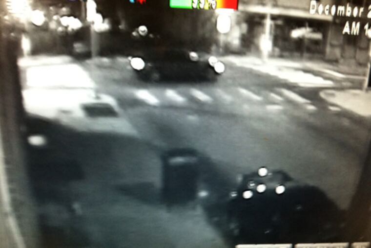 Police are seeking information on the driver and vehicle of this car that may have been involved in a hit and run Christmas Night in Kensington in the 3200 block of Frankford Avenue. Surveillance photo from Chuckles Bar.