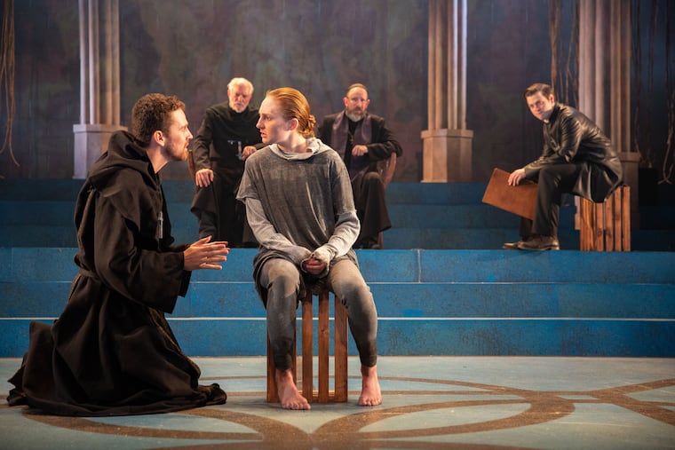 Clare O'Malley (center) and cast of "Saint Joan," through Feb. 24 at Delaware Theatre Company.