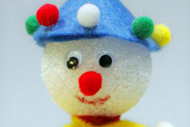 For a very tame way to celebrate April Fools' Day, make a jester
pencil topper. (Ed Suba Jr./Akron Beacon Journal)