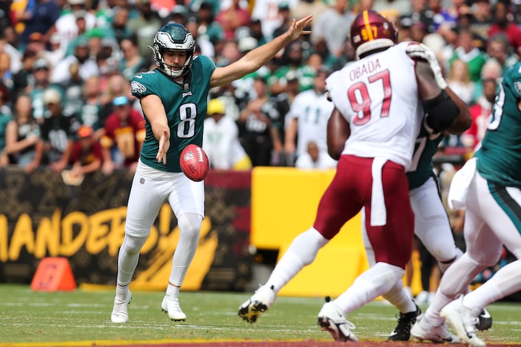 Arryn Siposs punts for the Eagles in the first half of the victory over Washington in September.