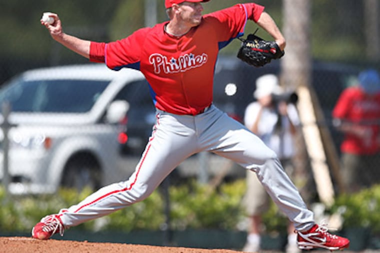 Roy Halladay pitched five innings in a minor-league game against the Pittsburgh Pirates yesterday. (David M Warren/Staff Photographer)