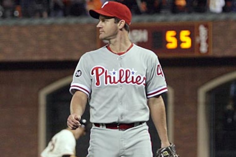 Roy Oswalt pitched the ninth inning of Game 4 of the NLCS and gave up the game-winning sacrifice fly to Juan Uribe. (Yong Kim / Staff Photographer)