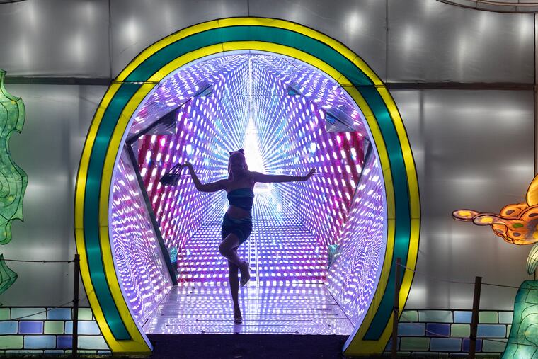 Morgan Baylor is viewed in the Kaleidoscope on opening night of the Philadelphia Chinese Lantern Festival.