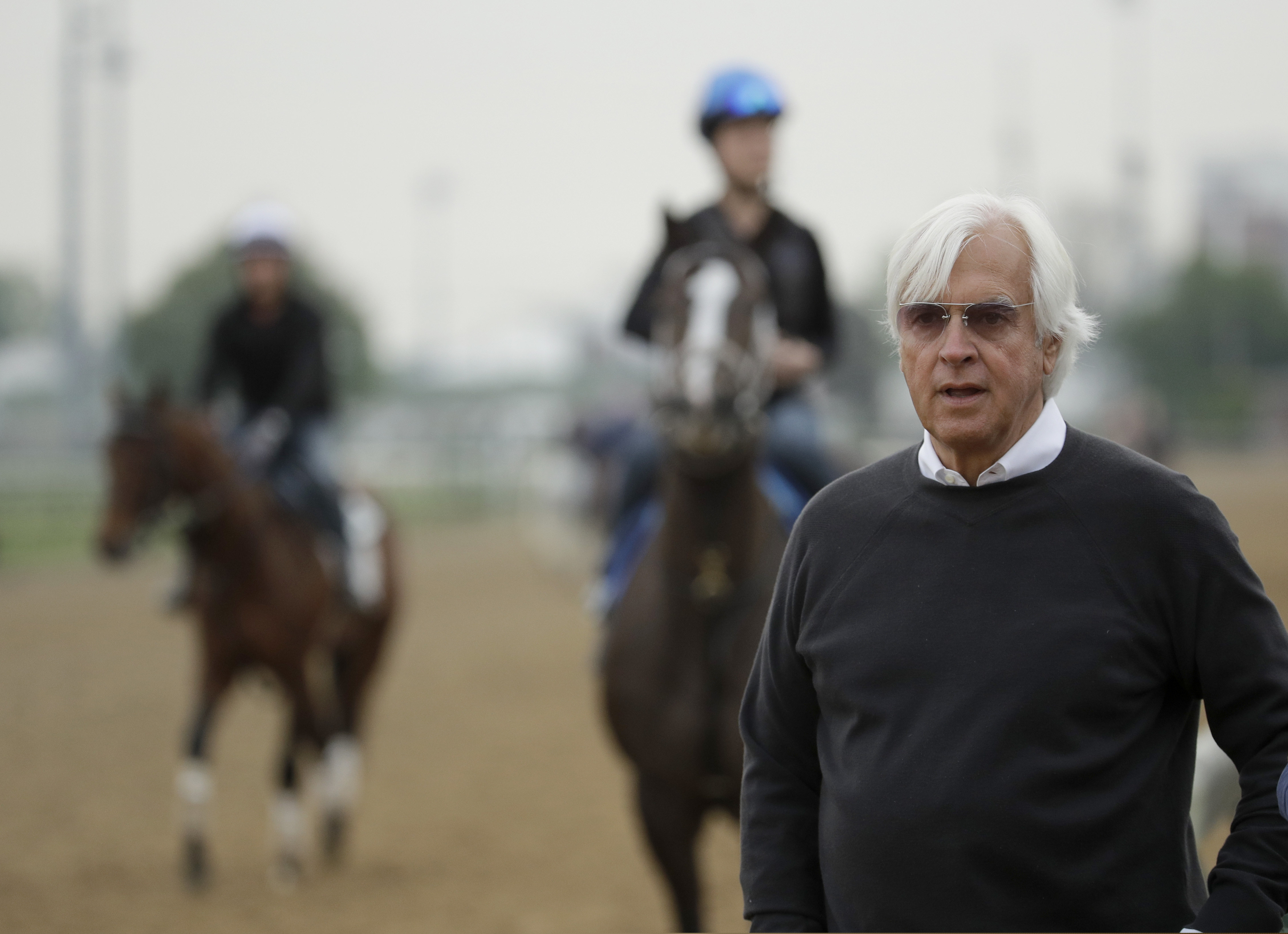 Trainer Bob Baffert goes for his eighth Preakness title with Improbable. (AP Photo/Charlie Riedel)