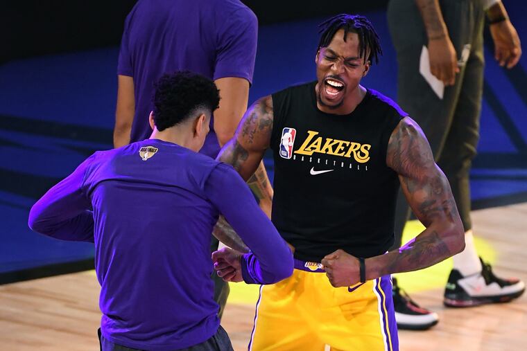 Lakers-turned-Sixers Dwight Howard and Danny Green (left) look to bring their championship mentality to Philadelphia.