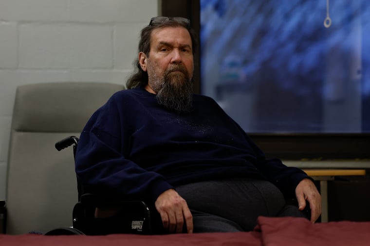 Robert Flesch sits in his wheelchair inside his room at the Gracedale Nursing Home in Nazareth, PA.