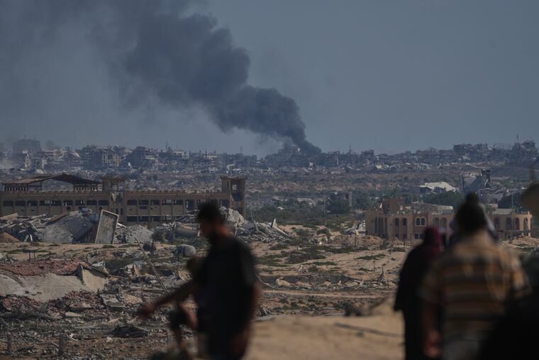 Smoke rises following an Israeli military strike in Gaza City on Thursday.